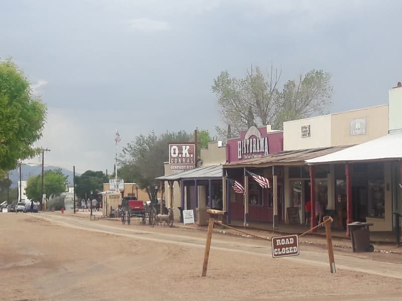 Entrance to the O.K. Corral gunfight site and Historama on Allen Street, Tombstone, with a buggy parked outside